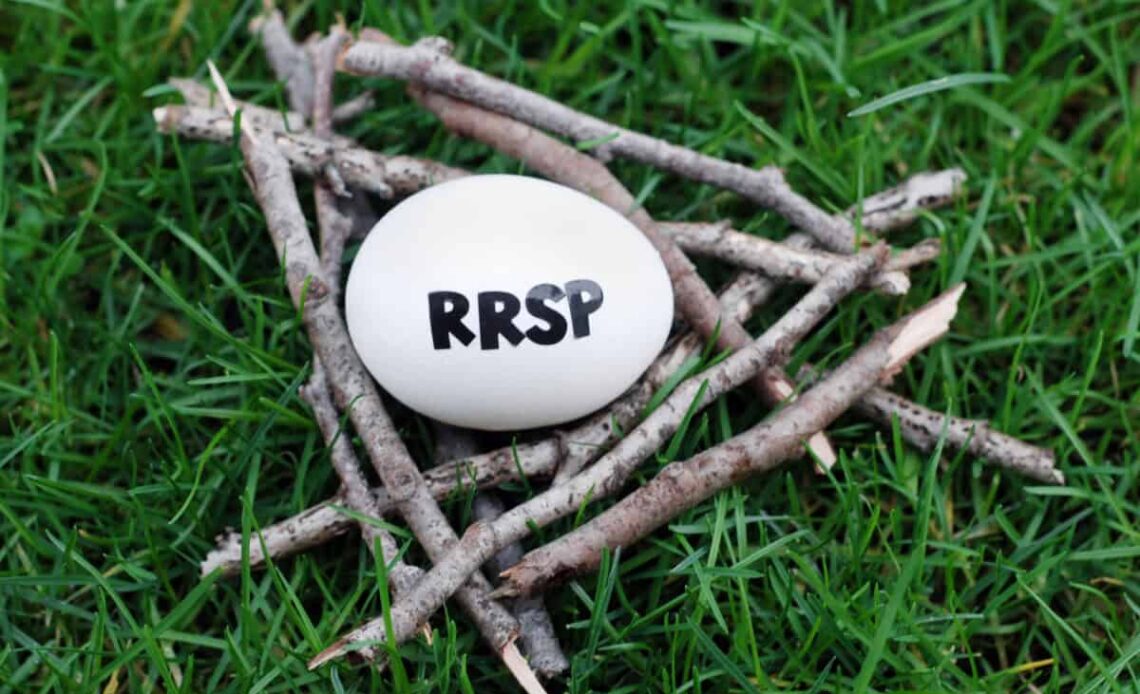 Close up of an egg in a nest of twigs on grass with RRSP written on it symbolizing a RRSP contribution.