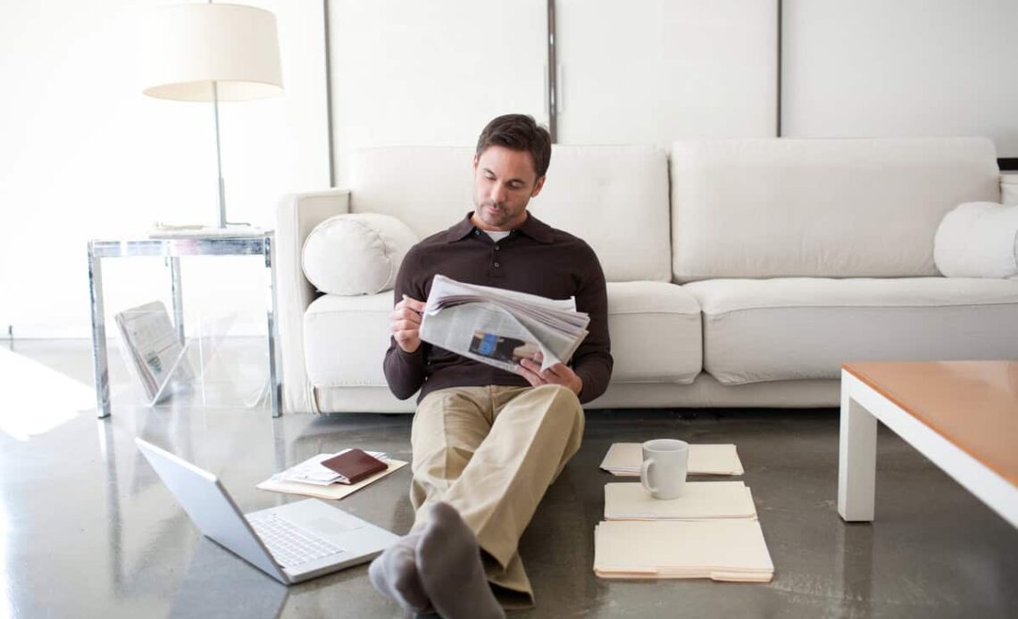 Investor reading the newspaper